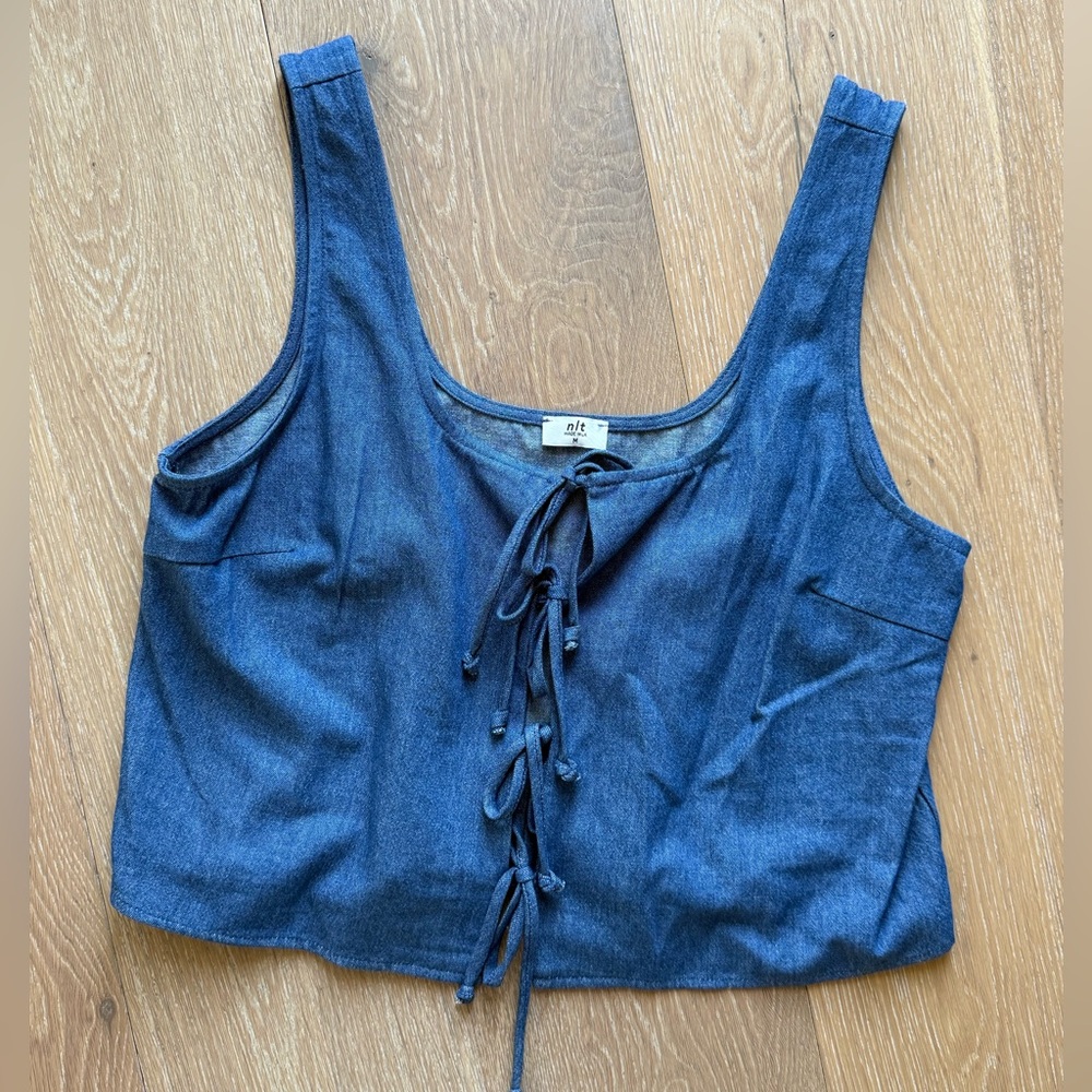 nlt tie top